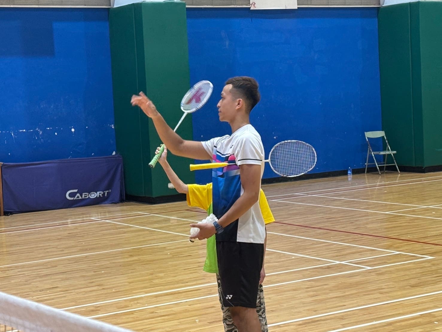 陪伴心智發展障礙兒少打羽球